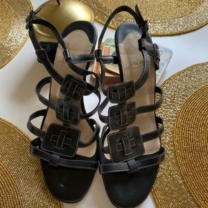 Christian Louboutin black heeled sandals.